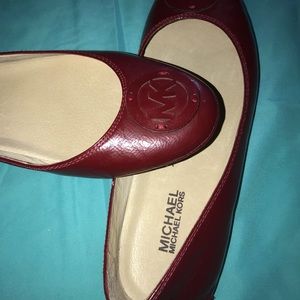 Michael Kors ballet flats.
